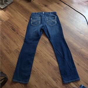 Classic Blue Boot Cut Jeans with Subtle Fading
